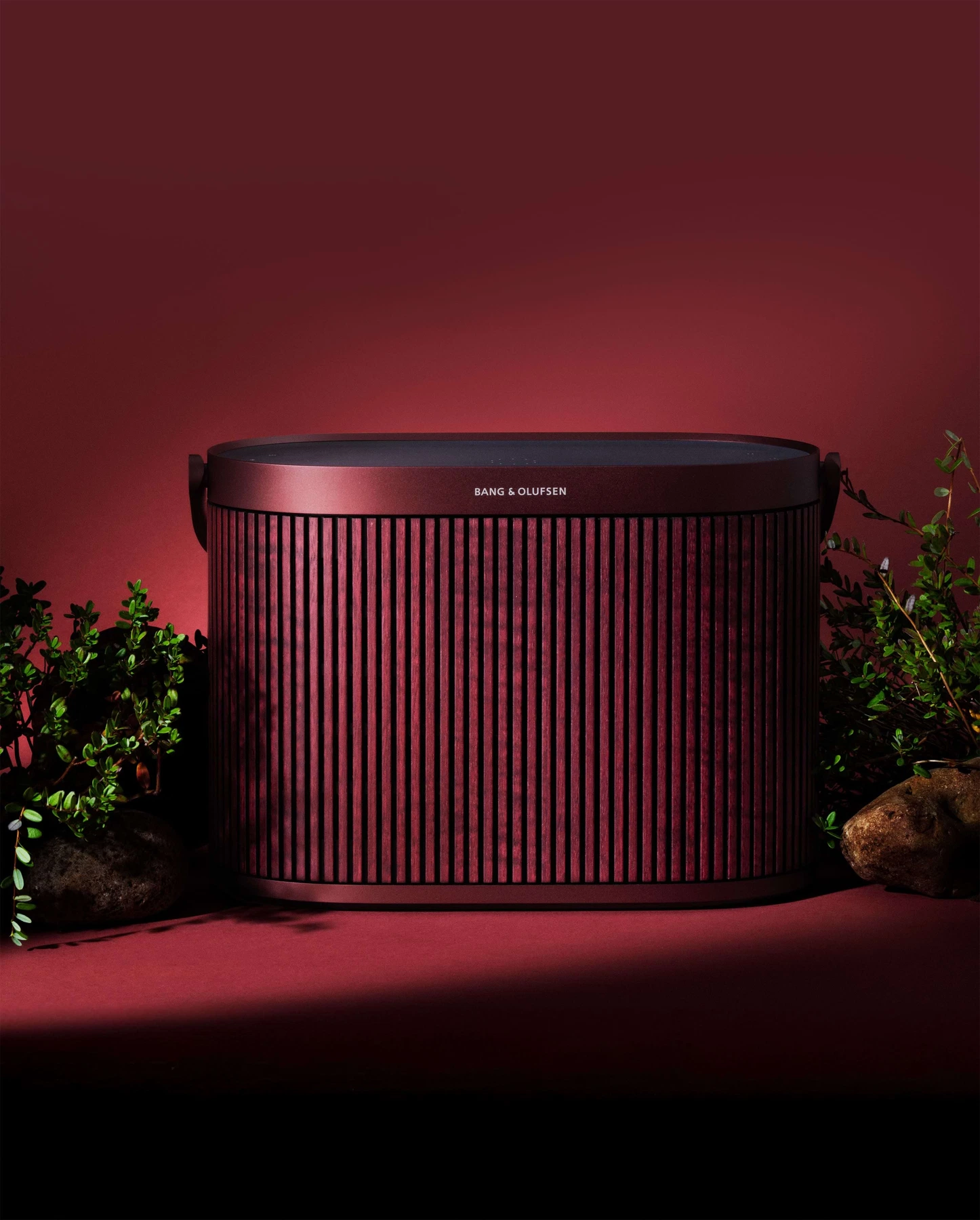 BANG & OLUFSEN Beosound A5 Limited Cranberry Raudona